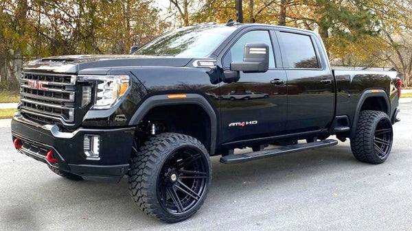 GMC Sierra AT4 2500 HD with 24x14 Wheels 4PF8 Forged on 33x14.5x24 Tires